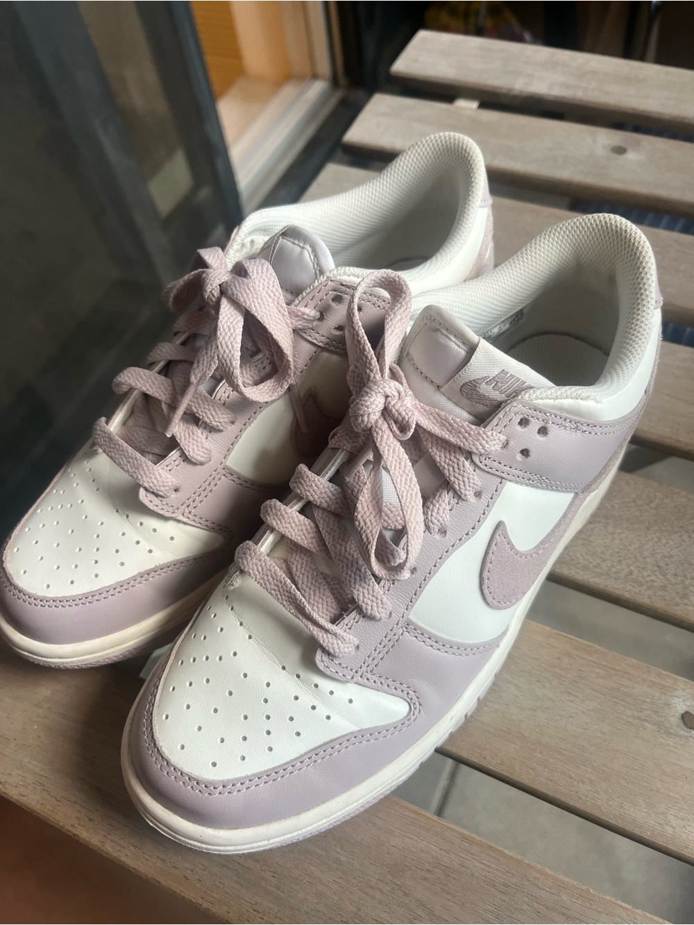 Nike Women’s Dunks Low-Top Sneakers in Pale Pink and White
